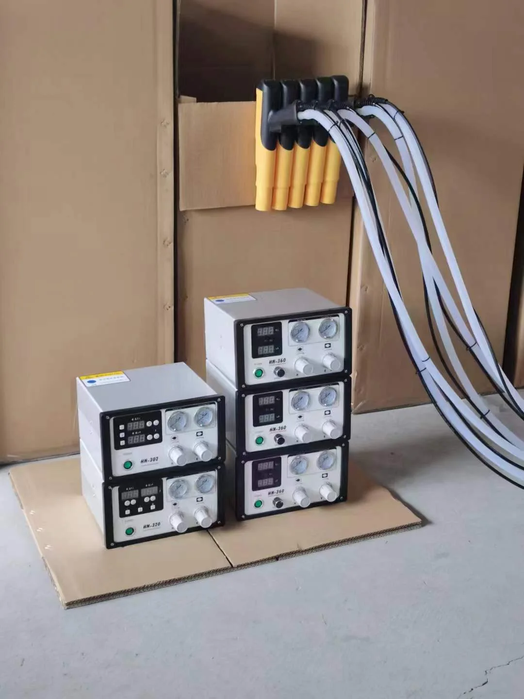 Powder coating controllers and automatic gun bodies prepared as a production batch