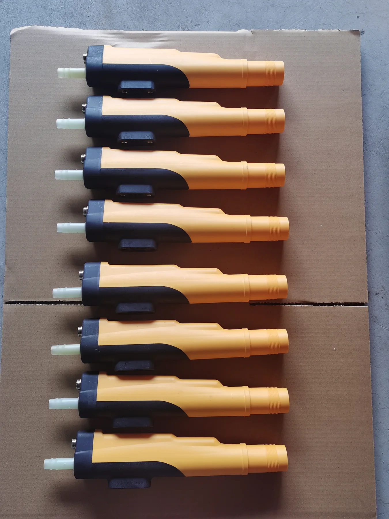 Corona powder gun bodies arranged during production